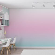 a pink and blue ombreed wall in a child's room with two white chairs