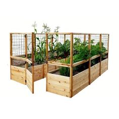 several wooden raised garden beds with plants growing in the top and bottom boxes on each side