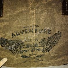 Angel Wing Adventure Shoulder Bag crafted from Repurposed Military Tent Canvas! This purse is strong, sturdy and sustainable. Ready for your next adventure but durable enough to make every day an adventure. Great Size Shoulder Bag, or Handbag, large enough to take as a small travel tote or small enough to use as a purse. Dimensions are 13" x 9" x 4". Antique Brass Accents Top Zipper Closure Back zipper Pocket One Inside Zippered Pocket Two Inside Pockets Outside Side Pocket (Fits a Water Bottle) Canvas Bags With Reinforced Handles For Outdoor Activities, Rugged Waxed Canvas Bag For Outdoor Activities, Eco-friendly Outdoor Tote Shoulder Bag, Rugged Outdoor Bags With Pockets, Rugged Outdoor Bags With Large Capacity, Rugged Outdoor Bag With Large Capacity, Rugged Large Capacity Bags For Outdoors, Rugged Large Capacity Bag For Outdoor, Casual Canvas Hiking Bag