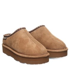 If you like a slip on with great support and durability both indoors and outdoors, these classic suede slippers will not disappoint. Whether you’re taking a late-night store run or reading a book in your favorite chair, these slippers will hug your feet and keep them perfectly warm with their wool blend lining. Suede Slippers, Size 10 Women, Reading A Book, Girls Sandals, Round Toe Heels, Dress Sandals, Suede Shoes, Boot Sandals, Dress With Boots