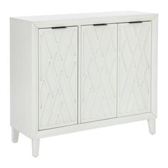 a white cabinet with three doors and two drawers