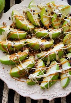 an apple salad with caramel and chocolate drizzled on top