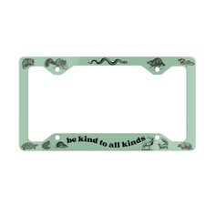 a green license plate frame with animals and the words be kind to all kinds on it