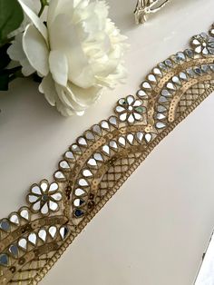 This Indian mirror embellished border beautifully crafted Indian mirror belt is very pretty for kaftans, mirror belts, embellished necks, saree trims, lehngas, sari borders, dupatta trims. Let your creativity flow and enhance your outfit :    Experience the magic of our geometric mirror  Trim, a true game-changer when it comes to adding a touch of glamour to your outfits. Picture shining mirror work in dazzling gold, masterfully crafted in a cutwork design, elevating your style to the next level Mirror Belt, Indian Mirror, Belt Wedding Dress, Scalloped Mirror, Mirror Work Blouse Design, Geometric Mirror, Mirror Work Blouse, Mirror Trim, Sequin Saree