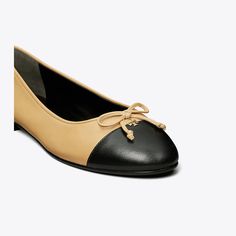 A classic ballet flat crafted in fine leather is finished with a contrast cap-toe and embellished with a bow. A subtle Double T initiates the elegant style as a new brand signature. Comfortable Ballet Flats, Designer Flats, Mule Sandals, Footwear Design Women, Ballet Flat, Leather Working, Elegant Style, Ballet Flats, Designer Shoes