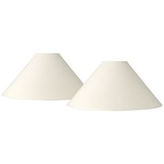 two white lamps are sitting next to each other