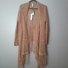 Nwt Chico's Tan Crocheted Traveler's Boho Fringe Hem Cardigan Size: 3 (Xl - 16) When Flat: Length: 41" (Shoulder To Fringe) Pit To Pit: 20" Sleeve: 24" - Boho Crocheted Cardigan - Fringe Hem And Open Front Style - Beautiful Sleeve Cuff And Large Panel Pattern - Perfect Condition, Never Worn Open To Offers/Bundle Discounts! Smoke-Free Home Ships Same/Next Day! Casual Fall Festival Cardigan, One Size Long Sleeve Cardigan With Fringe, One Size Long Sleeve Fringe Cardigan, Spring Fringe Long Sleeve Cardigan, Spring Long Sleeve Fringe Cardigan, Long Sleeve Open Knit Sweater For Festival, Beige Winter Outerwear For Festivals, Fringe Long Sleeve Cardigan For Festivals, Bohemian Open Knit Long Sleeve Outerwear