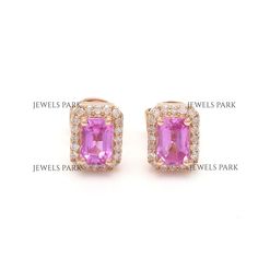 Pink sapphire diamond emerald cut earring studs gold | Natural pink sapphire halo diamond stud tops earrings gold | Pink sapphire stud gold GEMSTONE DETAILS : ✦ Gemstone : Pink Sapphire ✦ Gemstone Type : Natural ✦ Gemstone Size : 6x4 mm ✦ Gemstone Shape : Emerald cut / Octagon cut ✦ Number of Gemstones : 2 ✦ Gemstone Weight : 0.90 Carats ✦ Gemstone Grade : AAA DIAMOND DETAILS : ✦ Diamond Type : Natural ✦ Diamond Size : 1.10 MM ✦ Diamond Color : F-G ✦ Diamond Clarity : Slightly included ✦ Diamond Cut : Excellent  ✦ Diamond Weight : 0.15 Carats METAL DETAILS : ✦ Metal : 14K/18K Gold ✦ Metal Color : Yellow / White / Rose Gold ✦ Setting : Flush Setting ✦ Ring Box : Yes SHIPPING DETAILS : ✦ Production time : 10-12 days ✦ Delivery time : 7-8 days ✦ Expedited shipping : Available ✦ Expedited ship Baguette Cut Halo Design Jewelry Gift, Baguette Cut Halo Design Jewelry As Gift, Rectangular Halo Fine Jewelry, Elegant Gia Certified Pink Sapphire Jewelry, Tops Earrings Gold, Pink Sapphire Jewelry With Halo Design For Gifts, Elegant Pink Sapphire Jewelry With Halo Design, Fine Jewelry Gemstone Baguette Cut Earrings, Fine Jewelry Pink Sapphire With Emerald Cut