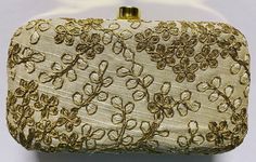 BRAND NEW, FROM New Delhi, INDIA--  no price tag though since they are purchased directly from manufacturer. I am the only USA-based seller for these purses on Ebay! Dupioni Silk fabric with metallic golden thread/silk thread embroidery on both sides! Very regal, rich look!! Crystals closure CLASP.  36- 40" inches chain/  removable. Both sides are the same Pattern. Approximate measurement is width 7"x height 4" (inches)Lined with matching satin fabric inside, no pockets.  Minor imperfections may Designer Beige Box Bag For Gift, Cream Rectangular Box Bag For Gifts, Rectangular Cream Box Bag For Gift, Rectangular Cream Box Bag For Gifts, Designer Gold Rectangular Case Bag, Designer Gold Box Bag, Rectangular Cream Evening Bag As Gift, Rectangular Cream Evening Bag Gift, Beige Rectangular Box Bag As Gift