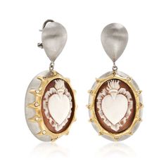 Italian Cameo Shell Sacred Heart Earrings in 18kt Gold Over Sterling Silver, pre-owned. These two-tone pear shape accent drop or dangle Cameo earrings feature the motif of the Sacred Heart. The earrings have both brushed and polished 18kt gold over sterling silver. The Cameo Shell Sacred Heart Cameo Earrings are enhanced with Cubic Zirconia accents. Crafted in Italy. Clip/post, shell cameo earrings. CZ weights are diamond equivalents Metal: Sterling Silver and 18 karat Gold (over sterling)Finish Flaming Heart, Shell Heart, Mesh Necklace, Cameo Earrings, Coin Pendant Necklace, Cameo Jewelry, Silver Jewellery Sets, Earring Sale, Fine Jewellery Earrings