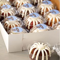 a box filled with bundt cakes sitting on top of a table