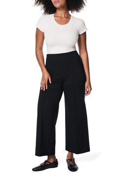 You'll feel ultra supported in these stretchy, cropped wide-leg pants fitted with a pull-on waist and booty-lifting and hidden core-shaping technology. Lined 68% Lenzing™ EcoVero™ rayon, 28% nylon, 4% elastane Lenzing EcoVero rayon is a more-sustainably produced fiber made using pulp made from renewable wood sources Machine wash, line dry Imported Cropped Wide Leg Pants, Ponte Pants, Workout Pants, Leg Pants, Classic Black, Wide Leg Pants, Top Brands, Wide Leg, High Rise