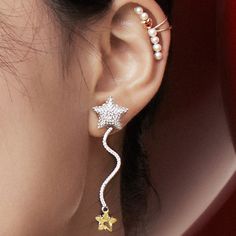 Starlight Balloon Dangle Earrings in 925 Sterling Silver Product Features: The designer incorporates elements such as gorgeous hot air balloons, bright stars, and dreamy unicorns into the design. Freeze the sweet picture of a lover holding a star balloon to create star balloon earrings. The elegant shape of the balloon ribbon, presented in an asymmetrical design, is full of fun. Product Information: Material: Sterling silver; Cubic zircon Color: Silver Size: Height 5.6cm,width 1.4cm Applicable G Whimsical Sterling Silver Jewelry For Party, Star-shaped Cubic Zirconia Earrings For Party, Star Shaped Cubic Zirconia Earrings For Party, Whimsical Star-shaped Party Jewelry, Celestial Sterling Silver Earrings For Party, Sterling Silver Star Jewelry For Party, Whimsical Sterling Silver Earrings For Party, Sterling Silver Party Jewelry With Star Charm, Whimsical Sterling Silver Party Earrings