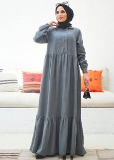 This Button Front Designed Long Maxi Dress is crafted from soft cotton denim and features long sleeves. Its timeless design makes it a perfect piece for any occasion. Its long maxi length and button front design make it a versatile and chic option for any wardrobe. Note: When selecting the right size for your item, remember that this designer usually runs one to two sizes smaller than other designers. If you find yourself between two sizes, it's always best to go with the larger one. We also tak Modest Long Sleeve Maxi Dress With Buttons, Long Sleeve Denim Blue Dress With Buttons, Denim Blue Long Sleeve Dress With Buttoned Pockets, Modest Cotton Maxi Dress For Fall, Long Sleeve Denim Dress With Button Closure, Cotton Long Sleeve Maxi Dress With Buttons, Long Sleeve Cotton Maxi Dress With Buttons, Cotton Button-up Maxi Dress For Fall, Long Sleeve Denim Dress With Buttons