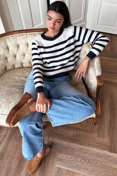 Organic cotton, Breton stripe sweater - wardrobe essential always good to have. Organic cotton Raglan style sweater Standard sleeve length Model is wearing a size small Hand wash and lay flat to dry Made in LA XS: Bust 36", Length 20 3/4" S: Bust 38", Length 21" M: Bust 40", Length 21 1/4" L: Bust 42", Length 21 1/2" Cozy Striped Cotton Sweater, White Striped Hem Sweater For Fall, Winter Cotton Sweater With Striped Sleeves, Striped Cotton Sweater For Fall, White Striped Hem Sweater For Winter, White Cotton Sweater With Contrast Stripes, White Sweater With Striped Sleeves For Fall, Long Sleeve Striped Sweater For Work, Long Sleeve Sweater With Contrast Stripes For Work