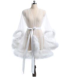 Sexy tulle robe with flirty marabou fur edge. Perfect for any special occasion such as prom, honey moon, Cocktail, Birthday, Photo Shoot, Masquerade Dancing Party, Anniversary, Engagement, Pageant, and more. Tulle, Fur, Satin Sash Length approx 34 inches Size S - suitable for size 0-6 Size M - suitable for size 8-14 Size L - suitable for size 16 - 20 Due to nature of the fur edge, some fur may fall off, however it will not affect the look. Turn around time around 1-2 weeks. Fancy Robes, Lingerie Party, Satin Sash, Ball Gowns Evening, French Lace, Dress Backs, Perfect Dress, Dress Making, Dresses Online