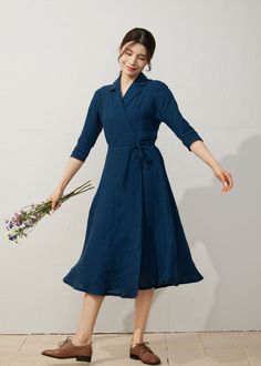 ★★ Welcome to my Ylistyle shop！！！ Indulge in the sophistication of a timeless navy blue linen wrap dress with a chic belted waist - a versatile essential for your Spring Summer wardrobe! Elevate your style effortlessly.  ★★FEATURES 100% linen fabric No lining Notched collar Two side pockets Half sleeve dress Belt waist dress Wrap linen dress Midi linen dress Perfect for summer,spring Wash by hand or machine with cold water ★★Mode size Height 170cm (5′ 7″) Bust 84 cm (33") Waist 66 cm (26") She w Affordable Navy Workwear Dress, Luxury Blue Midi Length Wrap Dress, Navy Dress With Cashmere Wrap, Spring Blue Linen Dress For Daywear, Blue Linen Long Sleeve Maxi Dress, Chic Blue Linen Maxi Dress, Casual Blue Linen Dress For Work, Elegant Blue Linen Midi Dress, Blue A-line Linen Midi Dress