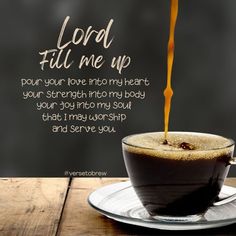 a cup of coffee on a saucer with the words, lord fill me up pour your love into my heart