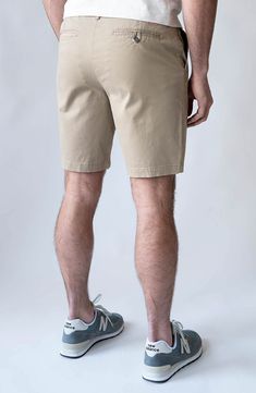 Cut with a modern straight fit, these performance shorts are crafted from sanded sateen twill for flexibility, comfort and shape retention. They're enzyme washed for worn-in style, and the pocket liners are made with recycled REPREVE® yarns. 9" inseam; 11" front rise 98% cotton, 2% spandex Machine wash, tumble dry Imported Classic Beige Cotton Bermuda Shorts, Chino Cotton Twill Shorts With Pockets, Classic Relaxed Fit Bermuda Shorts In Solid Color, Casual Fitted Shorts With Straight Hem, Fitted Beige Cotton Bermuda Shorts, Fitted Cotton Bermuda Shorts In Beige, Fitted Cotton Shorts With Straight Hem, Relaxed Fit Chino Cotton Twill Bottoms, Short Length, Relaxed Fit Chino Cotton Twill Bottoms In Short Length