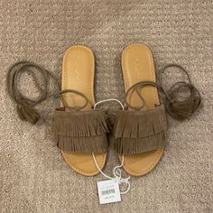 Double Fringe. Ankle Wrap With Tassels Casual Brown Sandals With Tassels, Spring Suede Lace-up Sandals, Flat Suede Sandals For Spring, Casual Suede Lace-up Beach Sandals, Casual Suede Lace-up Sandals For Beach, Closed Toe Sandals With Tassels For Spring, Casual Closed Toe Sandals With Tassels, Casual Flat Sandals With Tassels, Casual Open Toe Sandals With Tassels