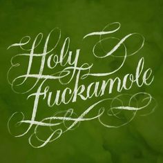 the words holly and fuckamale written in chalk on a green paper background