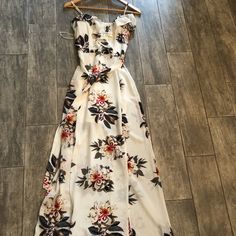 Gorgeous Floral Off Shoulder Dress. It Has Slits For Legs But Not Too High And Also Is Lined Just Past The Butt. Never Worn But Does Have A Stain On Inside From Storage And Moving, It Is Not Visible When Wearing At All. Perfect For Spring Wedding Or Easter White Floor-length Dress For Day Out, White Casual Floor-length Dress, White Floor-length Maxi Dress With Side Slits, White Split Dress For The Beach, Chic White Split Maxi Dress, White Split Beach Dress, White Split Maxi Dress For Vacation, White Summer Dress With Split, Casual Maxi Dress With Floral Print And Split