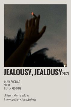 a person holding their hand up in front of a sky with the words, jellosy, jellosy 2012