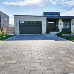 a large driveway in front of a house