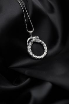 Title: Silver Ouroboros Necklace Serpent Pendant Dragon Pendant Snake Jewelry Birthday Gift for Him, Mythologic Jewellery *Important* It is ideal for daily use with an oxidized finish on 925 sterling silver, which makes details more attractive eye-catching. Other finishes available, all you need to do is note us after you made the purchase 🤗 - All of our products are handmade and their materials are 925 sterling silver. Chain Thickness: 0.09 Inches / 0.25 cm Chain Weight: 18 Inches 4.40 Grams 2 Snake-shaped Engraved Jewelry Gift, Engraved Snake-shaped Jewelry Gift, Snake Chain Jewelry As Gift, Ouroboros Necklace, Snake Eating, Greek Mythology Jewelry, Mythology Jewelry, Jewelry Product Shots, Attractive Eyes