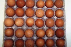 an egg carton filled with lots of brown eggs