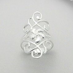 This Beautiful Ring Features A Celtic Flower Design, Crafted From 925 Sterling Silver. The Ring Is Available In Size 6 Or 9, And Has A Silver Color. The Metal Is Treated With No Main Stone Treatment, And Has No Additional Stones. The Ring Is Perfect For Those Who Appreciate Celtic Themes And Flowers. This Piece Is Made From High-Quality Materials, And Is A Great Addition To Any Jewelry Collection. Stamped 925 Flower Jewelry, Elegant Silver Flower Shaped Ring, Elegant Adjustable Sterling Silver Flower Ring, Elegant Flower Ring Stamped 925, Elegant White Sterling Silver Flower Ring, Elegant Silver Diamond Flower Ring, Elegant Silver Flower Ring Stamped 925, Elegant Adjustable Silver Flower Ring, Classic White Sterling Silver Flower Ring