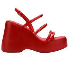 The Melissa Jessie Platform has four narrow straps over the foot and one around the heel, and counts on a buckle fastener that creates the perfect stable fit. It is light and comfortable, and the perfect versatile choice to keep you walking on clouds - both height-wise and comfort-wise! It is perfect for fashion lovers who want a retro-inspired, ultra-high style that is still extraordinarily comfortable. The platform sole extends all the way to the front of the shoe, which makes the wearer feel Synthetic Sandals With Red Sole And Ankle Strap, Synthetic Ankle Strap Sandals With Red Sole, Modern Heels With Strap And Round Toe, Double Strap Heels With Removable Insole, Modern Red Sandals With Single Toe Strap, Modern Red Heels With Removable Insole, Modern Red Sandals With Heel Loop, Chic Red Platform Sandals, Red Platform Wedge Sandals With Round Toe