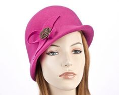 This elegant fuchsia felt hat was inspired by 1920th fashion. Featuring bucket shape with double brim and brass buckle, it is a perfect choice for autumn/winter race events or everyday casual wear. 
 We are making hats in Melbourne from 1963 and you can be assured of highest quality of materials and workmanship. Making Hats, 1920 Fashion, Top Hats, Brass Buckle, Felt Hat, Top Hat, Hats For Women, Bucket Hat, Autumn Winter