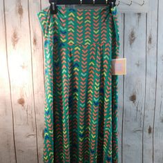 Nwt Lularoe Maxi Skirt Large Fun Bright Colors & Pattern! Colors Are Brighter Than Picture Shows. Tiny Pull In The Waistband -See Pic Great Summer Skirt!! Green Stretch Maxi Skirt For Spring, Green Stretch Maxi Skirt For Summer, Spring Stretch Yellow Maxi Skirt, Yellow Stretch Maxi Skirt For Spring, Yellow Maxi Skirts, Animal Print Maxi Skirt, Maxi Lace Skirt, Lularoe Maxi Skirt, White Maxi Skirts