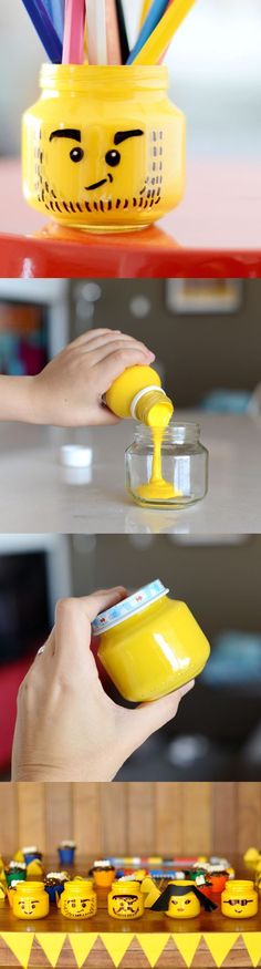 a person holding a yellow object in their hand and some other things on the table