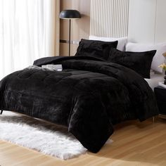 PRICES MAY VARY. Package Includes: 1 queen comforter (90" x 90") and 2 pillowcases (20" x 26"); Due to vacuum packaging, the comforter may appear thin and flat, please shake it vigorously to restore its fluffiness High-Quality Material: Side A: 220GSM short shaggy faux fur fabric; Side B: 100% brushed microfiber. Our comforter features a soft and warm short plush surface, retains a delicate appearance, resists knots after machine washing, and does not shed U-Shaped Quilting Design: The plush comforter is filled with 300g/m² microfiber cotton, and its U-shaped quilting keeps the filling in place for a softer, fluffier, and warmer feel Simple & Elegant: The faux fur comforter set provides a cozy and luxurious look, keeping you warm and comfortable throughout the year. It is a great choice fo Oversized King Quilt, Fur Bed Throw, Faux Fur Comforter, Fur Comforter, Fluffy Comforter, Fur Bedding, Fluffy Bedding, Sham Bedding