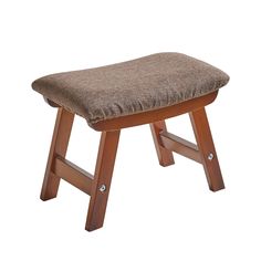 a small wooden stool with a brown seat cushion on it's backrest and legs