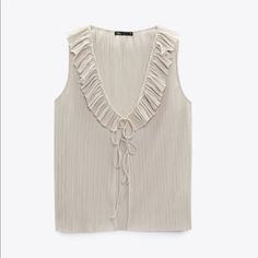 Sleeveless Ruffled V-Neck Top. Front Ties And Opening Brand New With Tags Elegant Spring Vest With Ruffles, Spring V-neck Tank Top With Ruffles, V-neck Ruffled Tank Top For Spring, Spring V-neck Ruffled Tank Top, Summer Tie Neck Blouse With Ruffles, Summer V-neck Ruffled Tank Top, V-neck Vest Blouse For Day Out, Sleeveless Ruffled Vest Blouse For Summer, Ruffled Sleeveless Blouse Vest For Summer