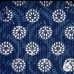 a blue and white floral pattern on fabric stock photo - 547982