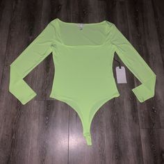 New Leith Neon Green Bodysuit Size M #20 Green Fitted One-piece Bodysuit, Fitted Green One-piece Bodysuit, Green Long Sleeve Bodysuit For Summer, Fitted Green Bodysuit For Night Out, Green Stretch Bodysuit For Spring, Fitted Green Bodysuit, Black Bodysuit Longsleeve, Green Bodysuit, Black Ballerina