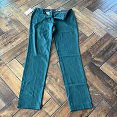 -Designer = Hugo Boss -Size= 8. Trunk 49 - Msrp = $278 -Color = Green -Style= Titana5. Hugo Boss Size 8 Titana5 Textured Green Unhemmed Plain Front Trouser -Inseam = Measured At Seam Of Crotch 5downwards To Bottom Tip Of Jeans/Pants = Approximately 88.5cm -Rise = Measured At Seam Of Crotch Upwards To Tip Of Front Of Waist Line= Approximately 24cm -Waist Circumference = Measured At Seam Of Point Where Waist Fly Edge Meets All Arotund To Same Point When Buttoned = Approximately 92cm -Genuine And A Green Straight Hem Pants For Work, Green Full-length Dress Pants For Work, Classic Fitted Green Dress Pants, Classic Green Fitted Dress Pants, Green Tapered Leg Elastane Pants, Green Slim Fit Bottoms For Work, Green Slim Fit Workwear Pants, Green Slim Fit Pants For Work, Formal Stretch Green Pants