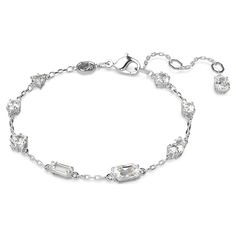 This dazzling bracelet is the perfect example of Mesmera’s surprising and elegant style. The exquisite piece features a delicate rhodium plated chain, scattered with wondrous Swarovski Zirconia in a mix of dramatic cuts. An extra stone is also placed at the end of the hanging elongation. Gift this with a matching necklace for the ultimate look of refinement. Crystal Diamond Cut Bracelets, Diamond Cut Crystal Bracelets, Modern Silver Bracelets With Sparkling Stones, Elegant Metal Bracelets With Sparkling Stones, Elegant Silver Chain Bracelet With Sparkling Stones, Modern Crystal Bracelets As Gifts, Elegant Chain Bracelet With Sparkling Stones For Formal Events, Elegant Chain Bracelet With Sparkling Stones For Formal Occasions, Elegant Formal Chain Bracelet With Sparkling Stones