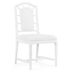 a white chair with a cushion on the seat and backrest, in front of a white background