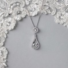 This cubic zirconia teardrop shaped pendant is a classic design for any special occasion. Available in rhodium, gold or rose gold plate. On a 16 inch chain with a 2 inch extender, it is 1 and 3/8 inch long and .5 inch wide, AAA grade CZ, nickel, cadmium, and lead free. Luxury Teardrop Pendant Wedding Jewelry, Elegant Teardrop Pendant Drop Necklace With Sparkling Stones, Formal Dangle Drop Necklace With Cubic Zirconia, Cubic Zirconia Dangle Drop Necklace For Formal Occasions, Formal Cubic Zirconia Drop Dangle Necklace, Teardrop Cubic Zirconia Necklace For Anniversary, Teardrop Cubic Zirconia Bridal Necklace With Brilliant Cut, Drop Necklace With Diamond Accents In Cubic Zirconia, Teardrop Diamond Necklace With Sparkling Stones