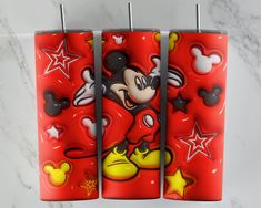 three red mickey mouse lighters with stars on them