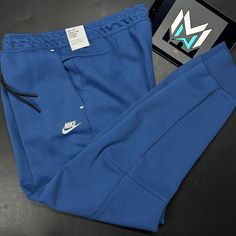 Nike Sportswear Tech Fleece Jogger Pants Marina Blue Black Cu4495-407 Men’s Size Measurements: 2xl Waist: 37 Inches Inseam: 27 Inches Length: 41 Inches 3xl Waist: 39 Inches Inseam: 28 Inches Length: 41.5 Inches Sporty Fleece Bottoms With Pockets, Blue Athleisure Activewear With Side Pockets, Blue Sportswear Pants For Gym, Blue Sporty Activewear With Side Pockets, Blue Athleisure Pants For Sports, Blue Activewear With Side Pockets For Sports, Blue Athleisure Sports Pants, Blue Fleece Casual Activewear, Nike Navy Bottoms For Loungewear