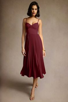 Our Emma Pleated Midi Dress is cut from stretch satin. She features a V neckline paired with adjustable spaghetti straps and a pleated A line skirt. Wear this style to your next event. Olive Green Formal Dress, Cream Formal Dresses, Bridesmaid Dresses Midi, Midi Tulle Dress, Red Wine Dress, Dress Up Closet, Atelier Dress, Green Formal Dresses, Wine Dress