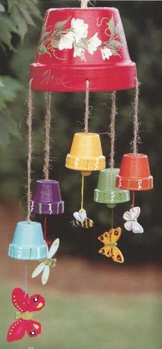 a colorful wind chime with the words cute or nah?