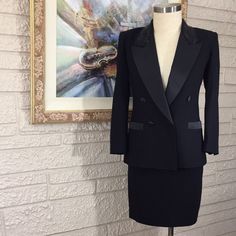 Beautiful Vintage Lined Wool Skirt Suit With Beaded Collar And Satin Trim Lapel And Pockets And Buttons. 100% Wool. Dry Clean Only. Flat Lay Measurement: Jacket: Length From Shoulder To Hem Is Approx 27". Sleeve Length From Shoulder Is Approx 23". Armpit To Armpit Is Approx 20". Shoulder To Shoulder Is Approx 17". Skirt: Length Is Approx 19.5". Across Front Waist Is Approx 15". Elegant Fitted Black Skirt Suit, Tailored Luxury Skirt Suit For Formal Occasions, Luxury Tailored Skirt Suit For Formal Occasions, Elegant Black Skirt Suit For Formal Occasions, Elegant Black Skirt Suit For Party, Elegant Embellished Mini Skirt, Luxury Fitted Skirt Suit For Formal Occasions, Elegant Black Skirt Suit For Evening, Formal Embellished Fitted Skirt