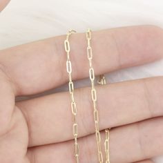 14k Yellow Gold Mini Paperclip Necklace | Paper Clip Necklace | Layering Necklace | Real Gold Necklace | Paper Clip Link Chain Necklace P R O D U C T 𝄪 D E T A I L S ✽ Metal: 14k Yellow Gold ✽ Chain Length: 14" - 20" ✽ Link Size: 4.8 mm x 1.2 mm ✽ Made to Order ✽ Bigger Paper Clip: https://etsy.me/400e00g O T H E R 𝄪 I N F O R M A T I O N ▪ All items are custom made to order.  ▪ Rush order: Please contact us before place your order to ensure that we can accommodate your deadline ▪ All items ar Gold-plated Paperclip Chain Necklace, Gold-tone Paperclip Chain Necklace, Elegant Gold-tone Paperclip Necklace, 14k Gold-filled Necklace With Adjustable Paperclip Chain, 14k Gold-tone Paperclip Chain Necklace, Real Gold Necklace, Yellow Gold Chain, Chain Ring, Chain Link Necklace